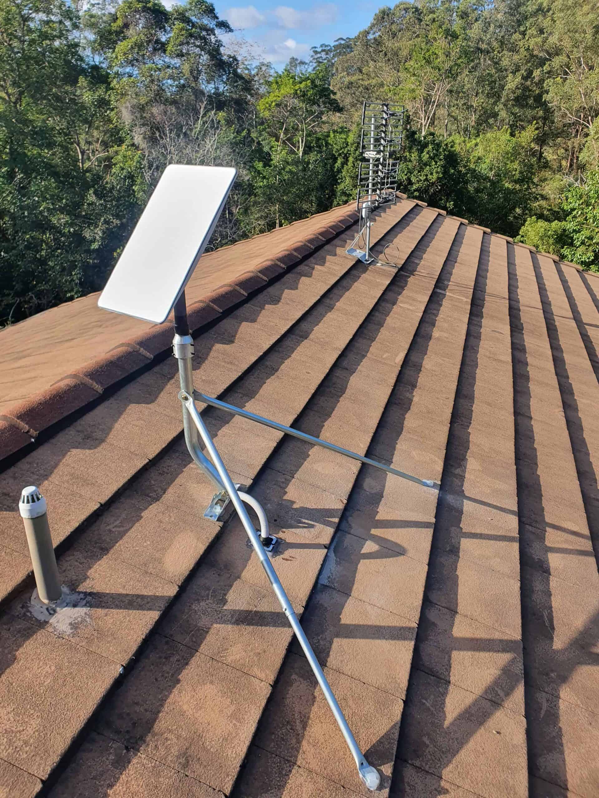 Starlink dish mounted on a tiled roof